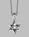 A stunningly appointed Star of David pendant, accented by black sapphires on a silver chain necklace. From the Kali Collection Silver Black sapphires, 0.216 tcw Pendant, ¾W X 1½H Necklace, 36 long Lobster clasp Imported 