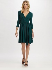 Offering a universally flattering fit, this wrap dress made from soft jersey would be a fantastic addition to any wardrobe.Alluring v-necklineThree-quarter sleevesSelf-tie beltAbout 24 from natural waist93% lyocell/7% elastaneDry cleanImported Model shown is 5'10½ (179cm) wearing US size Small. 