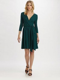 Offering a universally flattering fit, this wrap dress made from soft jersey would be a fantastic addition to any wardrobe.Alluring v-necklineThree-quarter sleevesSelf-tie beltAbout 24 from natural waist93% lyocell/7% elastaneDry cleanImported Model shown is 5'10½ (179cm) wearing US size Small. Offering a universally flattering fit, this wrap dress made from soft jersey would be a fantastic addition to any wardrobe.Alluring v-necklineThree-quarter sleevesSelf-tie beltAbout 24 from natural waist93% lyocell/7% elastaneDry cleanImported Model shown is 5'10½ (179cm) wearing US size Small.