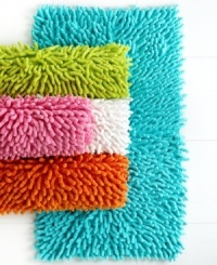 Crafted of plush cotton chenille, this Bambini bath rug is ultra-soft to the touch and come in five fun and vibrant colors to brighten up any bathroom. Crafted of plush cotton chenille, this Bambini bath rug is ultra-soft to the touch and come in five fun and vibrant colors to brighten up any bathroom.