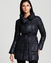 A belted waist lends a figure-flattering look to Armani Collezioni's plush cold-weather coat, filled with warm white goose down. A belted waist lends a figure-flattering look to Armani Collezioni's plush cold-weather coat, filled with warm white goose down.