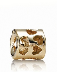 Shine some light on your personal style with PANDORA's heart cutout charm in 14K gold. Shine some light on your personal style with PANDORA's heart cutout charm in 14K gold.