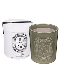 Diptyque teamed up with Virebent, a well-known porcelain manufacturer established in 1924, to make its 'indoor and outdoor' scented candle. It chose earthenware for its rustic touch and hand-crafted look, and because it embodies and brings to life the brand's emblematic oval. This four-wick Diptyque candle is made exclusively by hand and recalls the warm, familiar, sophisticated accord of rare woods throughout the long winter days. Burn time is approximately 150 hours. Diptyque teamed up with Virebent, a well-known porcelain manufacturer established in 1924, to make its 'indoor and outdoor' scented candle. It chose earthenware for its rustic touch and hand-crafted look, and because it embodies and brings to life the brand's emblematic oval. This four-wick Diptyque candle is made exclusively by hand and recalls the warm, familiar, sophisticated accord of rare woods throughout the long winter days. Burn time is approximately 150 hours.