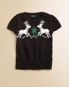 A charming crewneck sweater in a soft blend of plush yarns captures the spirit of the season with a classic intarsia-knit reindeer design.Ribbed crewneckCap sleevesShoulder buttonsRibbed cuffs and hemCottonHand washImported