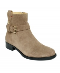 Smooth and short. Tommy Hilfiger's Twain booties feature a buckle around the ankle and a short stacked heel. Smooth and short. Tommy Hilfiger's Twain booties feature a buckle around the ankle and a short stacked heel.