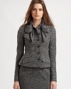 Luxurious tweed jersey in a structural, ladylike silhouette, embellished with a dramatic bow at the neck.Stand bow collar with hook-and-eye closuresButton frontFlap pocketsBack ventsFully linedAbout 23 from shoulder to hem72% wool/10% nylon/18% acrylicDry cleanMade in ItalyModel shown is 5'9 (175cm) wearing US size 4. 