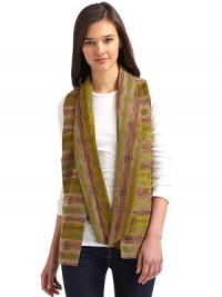 THE LOOKMulticolored & textured designOpen frontLong ties at neckSleevelessTHE FITAbout 27 from shoulder to hemTHE MATERIAL60% rayon/40% nylonCARE & ORIGINDry cleanMade in USAModel shown is 5'10 (177cm) wearing US size 4. THE LOOKMulticolored & textured designOpen frontLong ties at neckSleevelessTHE FITAbout 27 from shoulder to hemTHE MATERIAL60% rayon/40% nylonCARE & ORIGINDry cleanMade in USAModel shown is 5'10 (177cm) wearing US size 4.