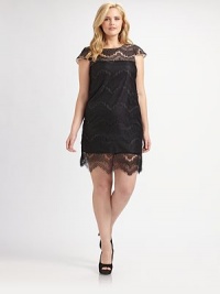 Delicate lace adds a whisper of whimsy and unmistakable intrigue to this classic silhouette.Cap sleevesBack tie at neckFully linedAbout 22 from natural waistLaceDry cleanMade in USA Delicate lace adds a whisper of whimsy and unmistakable intrigue to this classic silhouette.Cap sleevesBack tie at neckFully linedAbout 22 from natural waistLaceDry cleanMade in USA