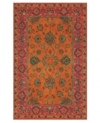 Drawing inspiration from the sandy ruins of ancient Petra and the traditional designs of India, this elegant, hand-tufted rug presents a rich decorative history set against a subtle red backdrop and accented with multiple gold and orange tones. Drawing inspiration from the sandy ruins of ancient Petra and the traditional designs of India, this elegant, hand-tufted rug presents a rich decorative history set against a subtle red backdrop and accented with multiple gold and orange tones.