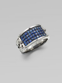 A tapered design in rhodium plated sterling silver is defined by four rows of tiny blue sapphires.Sterling silverBlue sapphiresAbout 1½ diamImported A tapered design in rhodium plated sterling silver is defined by four rows of tiny blue sapphires.Sterling silverBlue sapphiresAbout 1½ diamImported