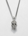 Sterling silver 'Small Day Of The Dead' skull pendant with intricately carved cross-shaped eyes suspends from a curb link chain with signature logo detail.Sterling silverLength about 24Lobster claspMade in USA