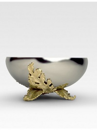 A gleaming addition to any table, handcrafted by European artisans in polished stainless steel with 24k gold gilded leaves at the base. From the Lamina Collection 12 diam. Hand wash Imported A gleaming addition to any table, handcrafted by European artisans in polished stainless steel with 24k gold gilded leaves at the base. From the Lamina Collection 12 diam. Hand wash Imported