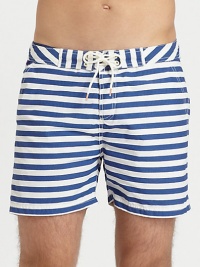 Summertime essential in a crisp, cotton blend finished in bold stripes for a nautical-inspired feel.Drawstring-tie waistSide slash, back welt pocketsInseam, about 465% cotton/35% nylonMachine washImported Summertime essential in a crisp, cotton blend finished in bold stripes for a nautical-inspired feel.Drawstring-tie waistSide slash, back welt pocketsInseam, about 465% cotton/35% nylonMachine washImported
