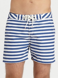 Summertime essential in a crisp, cotton blend finished in bold stripes for a nautical-inspired feel.Drawstring-tie waistSide slash, back welt pocketsInseam, about 465% cotton/35% nylonMachine washImported