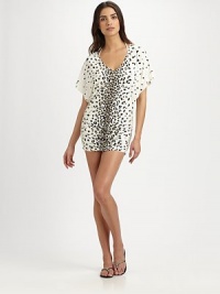 A fitted silhouette and animal print unite to create this seductive tunic. V-neckKimono sleevesPull-on style87% nylon/13% spandexHand washImported A fitted silhouette and animal print unite to create this seductive tunic. V-neckKimono sleevesPull-on style87% nylon/13% spandexHand washImported