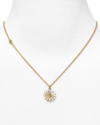 14 kt. yellow gold-plated brass. Gift boxed. Lobster clasp. White enamel daisy pendant with yellow crystal center.