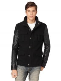 Classic meets edgy in this Calvin Klein Jeans jacket, combining a military style design and leather-like details. Classic meets edgy in this Calvin Klein Jeans jacket, combining a military style design and leather-like details.