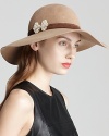 Top off your look with elegance in Kathy Jeanne's velour floppy hat, adorned with a removable crystal-and-pearl pin.