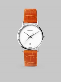 From the Koppel Collection. A vibrant alligator-embossed strap punctuates this sporty yet elegant timepiece.Quartz movement Water-resistant to 3 ATM Stainless steel case, 32mm (1.25) White dial Date display at 6 o'clock Second hand Alligator-embossed calfskin strap Comes with extra black calfskin strap Made in Switzerland