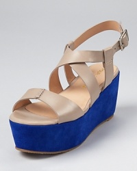 Classic, neutral hues are partnered with color block brights on Pour La Victoire's Noele sandal; a flatform wedge heel takes the on-trend style over the top. Classic, neutral hues are partnered with color block brights on Pour La Victoire's Noele sandal; a flatform wedge heel takes the on-trend style over the top.