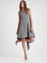 EXCLUSIVELY AT SAKS. EXCLUSIVELY AT SAKS.