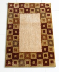 In plush cotton velour with a rich geometric motif, this decadently soft bath mat makes the canvas for very comfy feet. In plush cotton velour with a rich geometric motif, this decadently soft bath mat makes the canvas for very comfy feet.