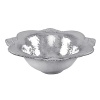 Shaped by hand of durable recycled aluminum, this striking serving bowl from Mariposa is detailed with a softly textured finish and beaded edges for a look that's at once organic and refined.