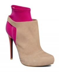 Push fashion boundaries with confidence. The Celio booties by RACHEL Rachel Roy are a unique take on the colorblock trend with a magenta sock and orange heel against nude leather. Push fashion boundaries with confidence. The Celio booties by RACHEL Rachel Roy are a unique take on the colorblock trend with a magenta sock and orange heel against nude leather.