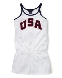 A red, white and blue design with USA patching gives a preppy, all-American look to a pretty warm-weather romper in celebration of Team USA's participation in the 2012 Olympics. A red, white and blue design with USA patching gives a preppy, all-American look to a pretty warm-weather romper in celebration of Team USA's participation in the 2012 Olympics.