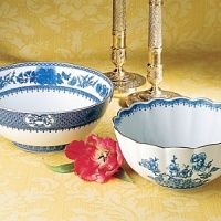 Edged in gold, this distinguished dinner service is based on a Chinese export porcelain pattern circa 1730 featuring a flowered medallion and floral sprays. Edged in gold, this distinguished dinner service is based on a Chinese export porcelain pattern circa 1730 featuring a flowered medallion and floral sprays.