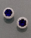 Mesmerizing, midnight blue. Turn an evening out into an event with these CRISLU button earrings featuring round-cut blue corundum (1-3/4 ct. t.w.) surrounded by cubic zirconia (1/2 ct. t.w.). Earrings set in platinum over sterling silver.