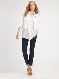 The classic denim topper, closely cropped in a slim-fitting silhouette.Point collarButton-down frontFront chest pocketsAbout 20 from shoulder to hem94% cotton/5% polyester/1% Lycra Made in USAModel shown is 5'10 (178cm) wearing US size Small. The classic denim topper, closely cropped in a slim-fitting silhouette.Point collarButton-down frontFront chest pocketsAbout 20 from shoulder to hem94% cotton/5% polyester/1% Lycra Made in USAModel shown is 5'10 (178cm) wearing US size Small.