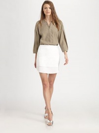 Utilitarian details define this zipper-front henley crafted from a washed silk and rayon blend.Jewel necklineFront-zip placketDropped shouldersPleated gathered sleevesShirttail hemAbout 29 from shoulder to hem60% rayon/40% silkHand washImportedModel shown is 5'9½ (176cm) wearing US size 4. Utilitarian details define this zipper-front henley crafted from a washed silk and rayon blend.Jewel necklineFront-zip placketDropped shouldersPleated gathered sleevesShirttail hemAbout 29 from shoulder to hem60% rayon/40% silkHand washImportedModel shown is 5'9½ (176cm) wearing US size 4.