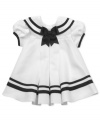 If she's going on her first cruise, she'll look super adorable in this nautical sailor dress by Rare Editions.