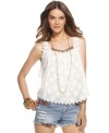 Beading details add a hint of shine to this otherwise sweetly femme crochet-lace Free People tank -- a hot summer topper over denim!