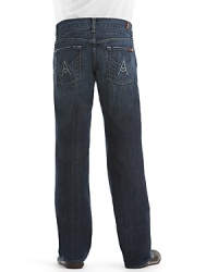 7 For All Mankind bootcut jeans. In a dark wash with slight fading and distressing. Zip fly and button closure. Back pocket features 7 for All Mankind's classic A embroidery. Zip fly. 7 For All Mankind bootcut jeans. In a dark wash with slight fading and distressing. Zip fly and button closure. Back pocket features 7 for All Mankind's classic A embroidery. Zip fly.