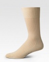 Smooth cotton in a mid-calf height for every day of the week. Cotton; machine wash Imported