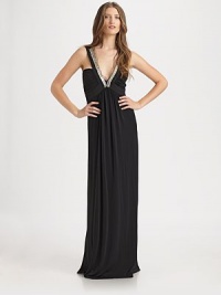 Luxe matte jersey in a floor-sweeping silhouette trimmed with glittering sequins and mesh at the neckline.V necklineWide strapsRuched bodiceEmpire waistAbout 45 from natural waist74% acetate/20% nylon/6% spandexDry cleanMade in USA of imported fabricModel shown is 5'9 (175cm) wearing US size Small. Luxe matte jersey in a floor-sweeping silhouette trimmed with glittering sequins and mesh at the neckline.V necklineWide strapsRuched bodiceEmpire waistAbout 45 from natural waist74% acetate/20% nylon/6% spandexDry cleanMade in USA of imported fabricModel shown is 5'9 (175cm) wearing US size Small.