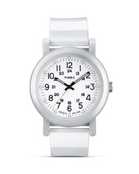 A simple design based on vintage style, this round-faced watch from Timex is updated with modern features and a white strap. A simple design based on vintage style, this round-faced watch from Timex is updated with modern features and a white strap.