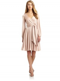 THE LOOKSurplice v-neckGently ruched skirtLong sleeves with elastic cuffsSelf-tie wrap beltBack zip with hook-and-eye closureTHE FITAbout 37 from shoulder to hemTHE MATERIALPolyesterFully linedCARE & ORIGINDry cleanImportedModel shown is 5'10 (177cm) wearing US size Small. THE LOOKSurplice v-neckGently ruched skirtLong sleeves with elastic cuffsSelf-tie wrap beltBack zip with hook-and-eye closureTHE FITAbout 37 from shoulder to hemTHE MATERIALPolyesterFully linedCARE & ORIGINDry cleanImportedModel shown is 5'10 (177cm) wearing US size Small.