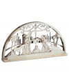 The perfect decoration for your holiday table or mantle, this Nativity centerpiece depicts the traditional birth of baby Jesus in a clean, simple design.