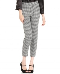 Get the skinny on style with Nine West's pants! The houndstooth-check fabric looks perfectly appropriate with a blouse and blazer for the office -- and equally cute with other tops for the weekend. Get the skinny on style with Nine West's pants! The houndstooth-check fabric looks perfectly appropriate with a blouse and blazer for the office -- and equally cute with other tops for the weekend.