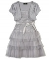 Beautiful glistening shrug tier dress by BCX with tiers of ruffles and accented with a ribbon waist.