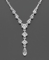 Elevate your style with a glamourous crystal cluster Givenchy necklace in silvertone. Length measures 17 inches with 3 inch extender at back and 2-1/2 drop at front.