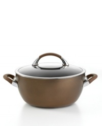 A deep, rich chocolate tone, with a superior nonstick finish and graceful, wide shape, turns things up in the kitchen, making every meal a mixture of sophistication and ease. Constructed for professional performance with a hard-anodized construction, impact-bonded stainless steel base and dishwasher-safe finish. Lifetime warranty. A deep, rich chocolate tone, with a superior nonstick finish and graceful, wide shape, turns things up in the kitchen, making every meal a mixture of sophistication and ease. Constructed for professional performance with a hard-anodized construction, impact-bonded stainless steel base and dishwasher-safe finish. Lifetime warranty.