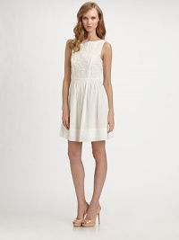 A classically feminine silhouette, rendered in crisp cotton voile and decorated with abstract, floral-inspired embroidery.BoatneckSleevelessBodice embroideryFull skirtSide slash pocketsV back with concealed zipFully linedAbout 25 from natural waistCottonDry cleanImportedModel shown is 5'11 (180cm) wearing US size 4. A classically feminine silhouette, rendered in crisp cotton voile and decorated with abstract, floral-inspired embroidery.BoatneckSleevelessBodice embroideryFull skirtSide slash pocketsV back with concealed zipFully linedAbout 25 from natural waistCottonDry cleanImportedModel shown is 5'11 (180cm) wearing US size 4.