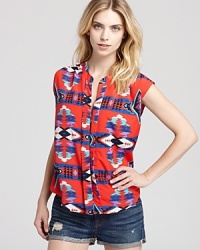 Beachside or barbecue-bound, this Aqua tribal-print blouse adds color and spirit to your laid-back look. Team it with distressed denim for a lived-in, love-worn combo. Beachside or barbecue-bound, this Aqua tribal-print blouse adds color and spirit to your laid-back look. Team it with distressed denim for a lived-in, love-worn combo.