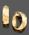 Classic 14k gold hoop earrings with a twist.  Approximate diameter: 3/4 inches.