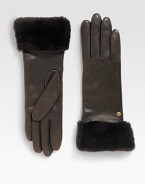 Durable deerskin leather accented with luxurious cashmere lining and shearling sheepskin cuff.Metal logo detailAbout 11 longSpecialist dry cleanImportedFur origin: Spain