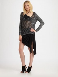 This chunky open-knit layers perfectly in a lean V-neck silhouette.V necklineLong sleevesVented hemAbout 26 from shoulder to hem66% cotton/17% viscose/10% linen/7% nylonDry cleanImportedModel shown is 5'9½ (177cm) wearing US size Small. This chunky open-knit layers perfectly in a lean V-neck silhouette.V necklineLong sleevesVented hemAbout 26 from shoulder to hem66% cotton/17% viscose/10% linen/7% nylonDry cleanImportedModel shown is 5'9½ (177cm) wearing US size Small.